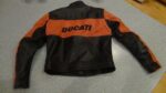 Ducati Motorcycle Black And Orange Leather Jacket - Image 2