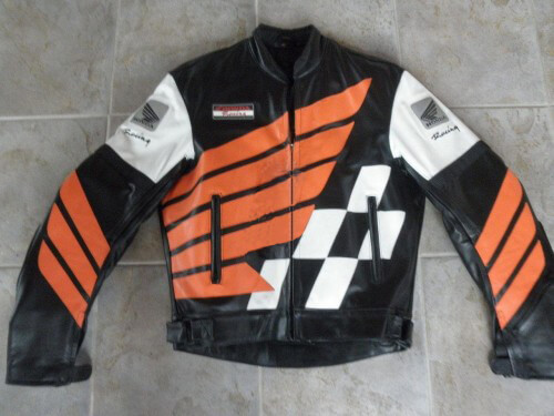 Honda-Motorcycle-Black-And-Orange-Racing-Leather-Jacket-1.jpg Honda Motorcycle Black And Orange Racing Leather Jacket - Image 1